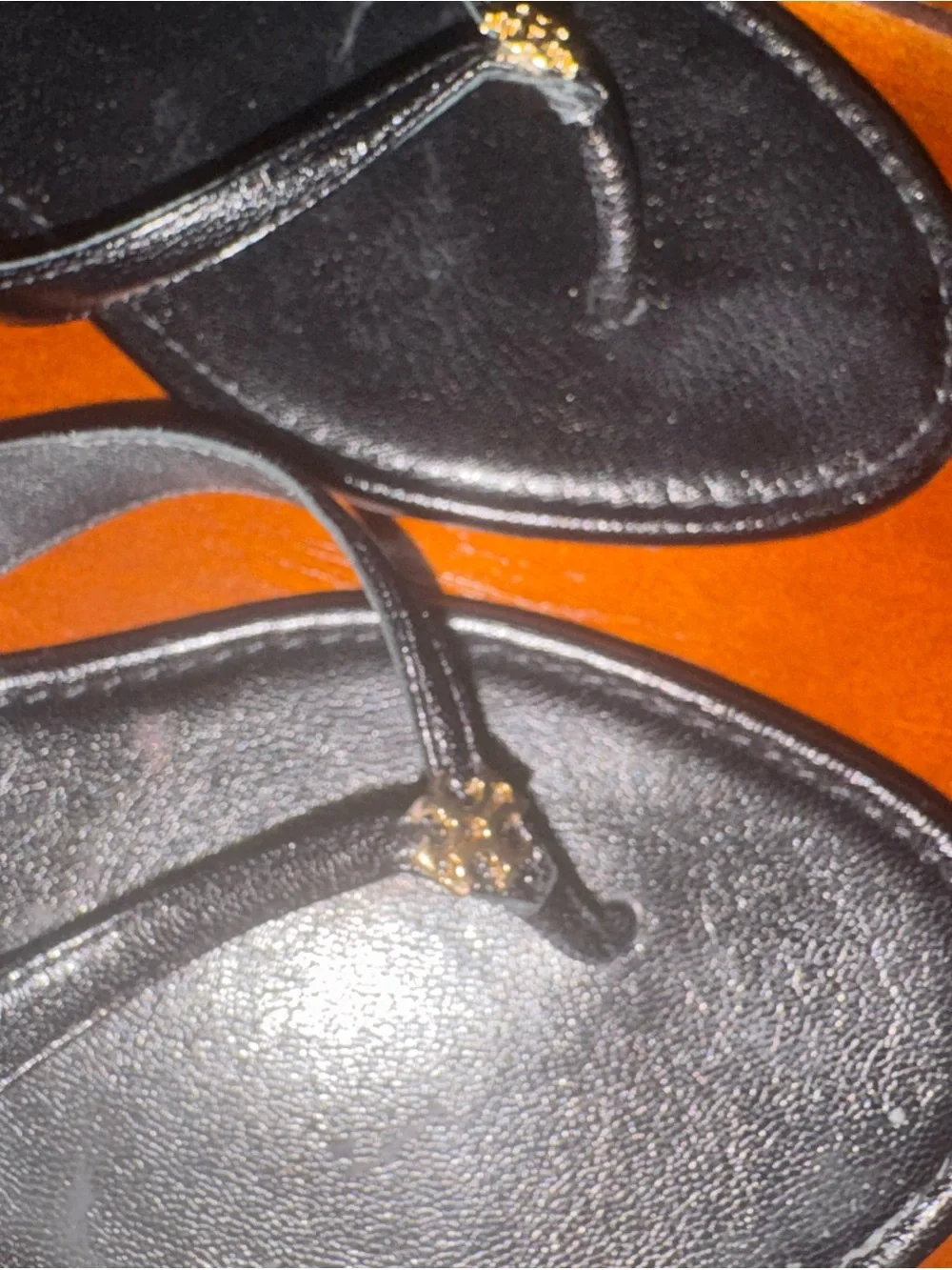 Tory Burch Black Leather Thong Sandals with Gold Logo Accent